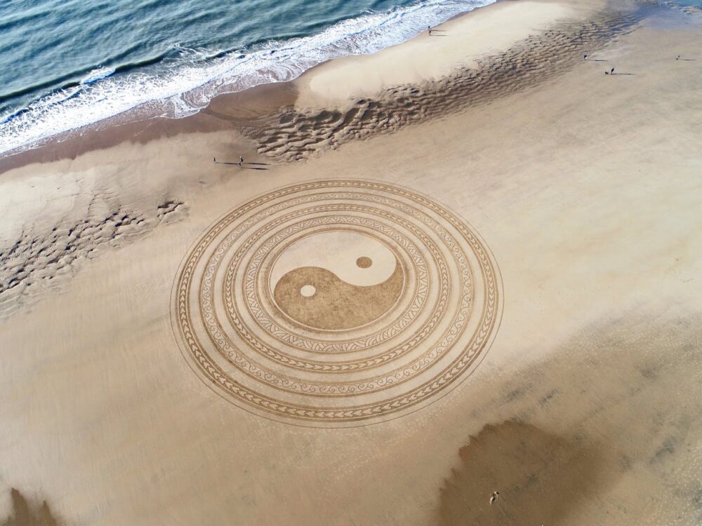 Ying yang playa arena calma paz PAS